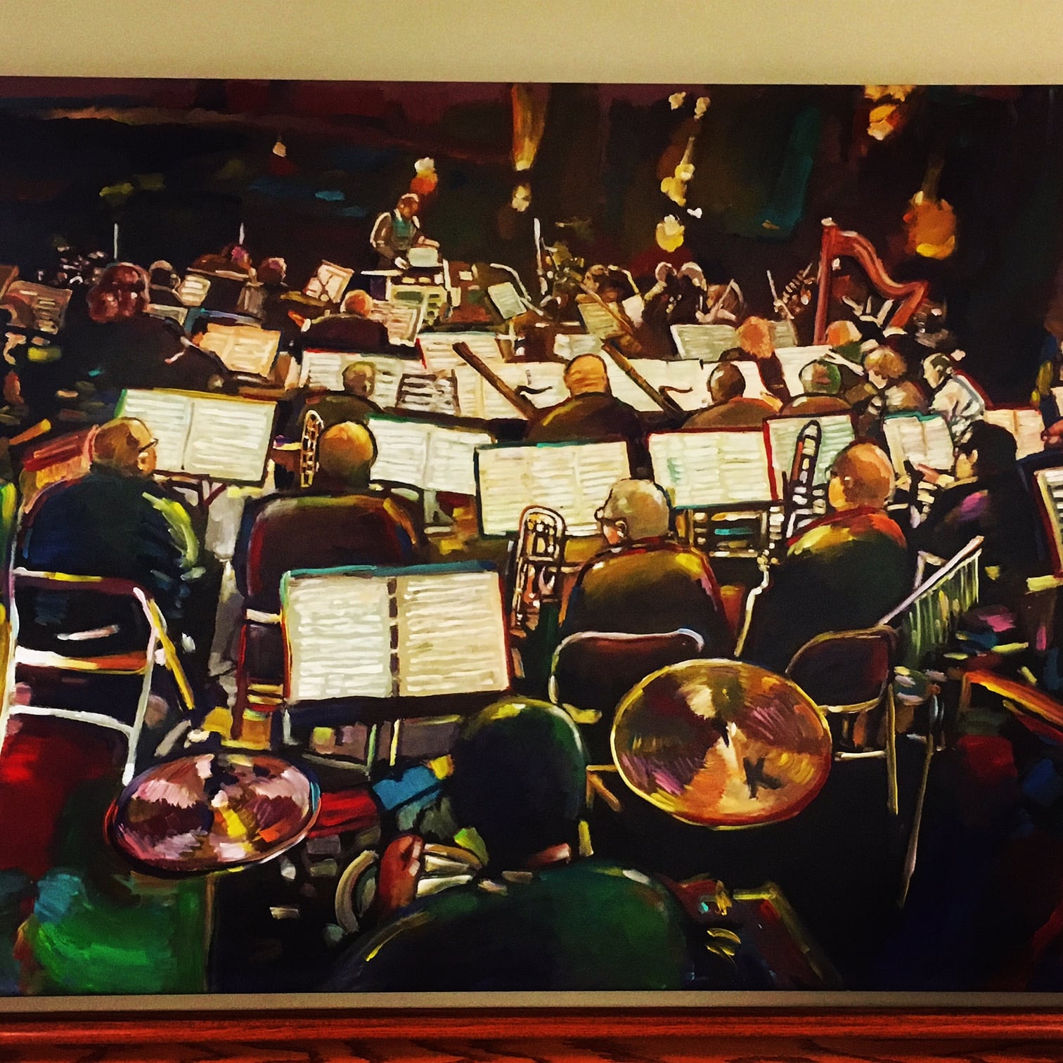 A different angle of the Wellesley Symphony Orchestra, this one by painter Howie Green, donated to Mass Bay by the artist.