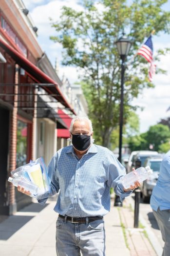 Steve Varriale, owner of O'Neil Jewelers in Wellesley unloading PPE and back to business supplies.
