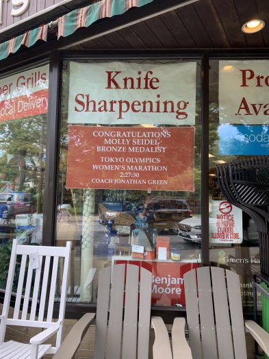 green's hardware olympics sign